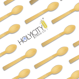 Holy City Straw Co. wrapped bamboo spoons lined up on angle